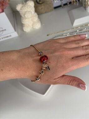 Gold-Tone Charm Bracelet with Red Ladybug Bead
